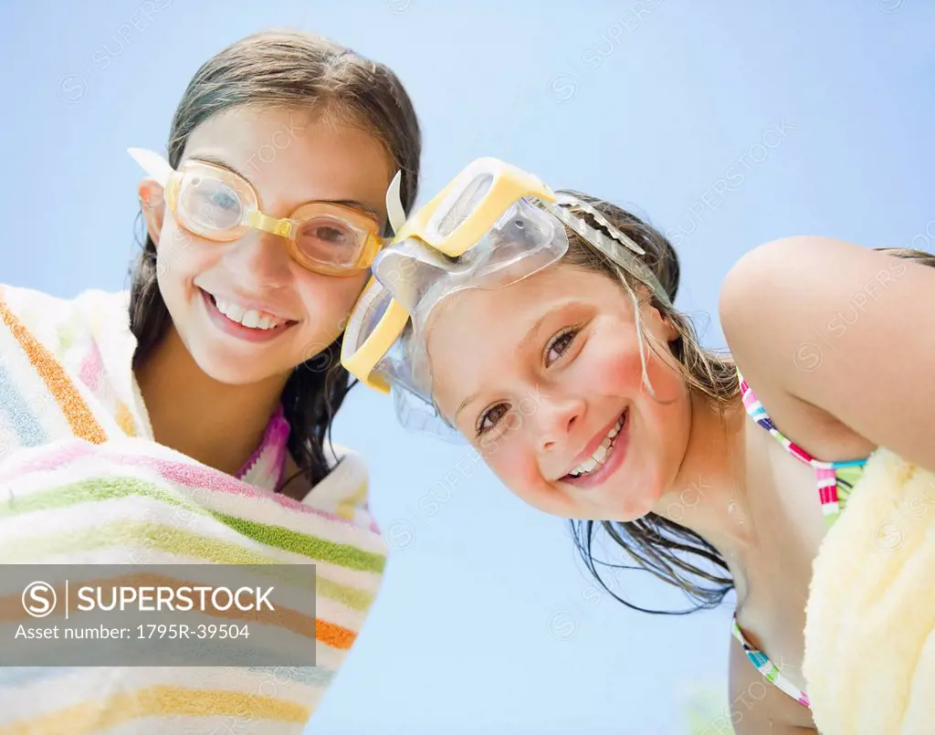 USA, New York, Two girls 10_11, 10_11 wearing swimming goggles