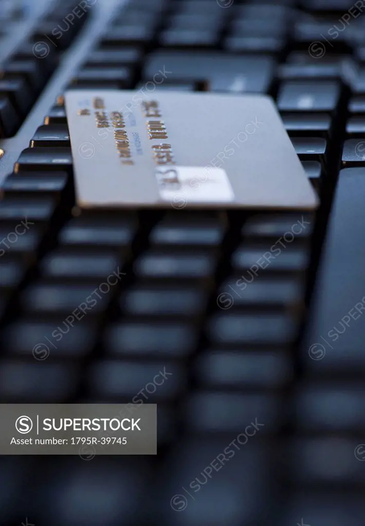 USA, New Jersey, Jersey City, Close_up view of computer keyboard and credit card