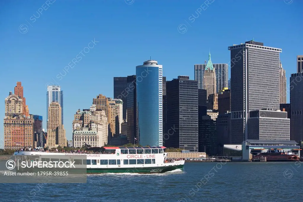 USA, New York City, Manhattan skyline with ferry