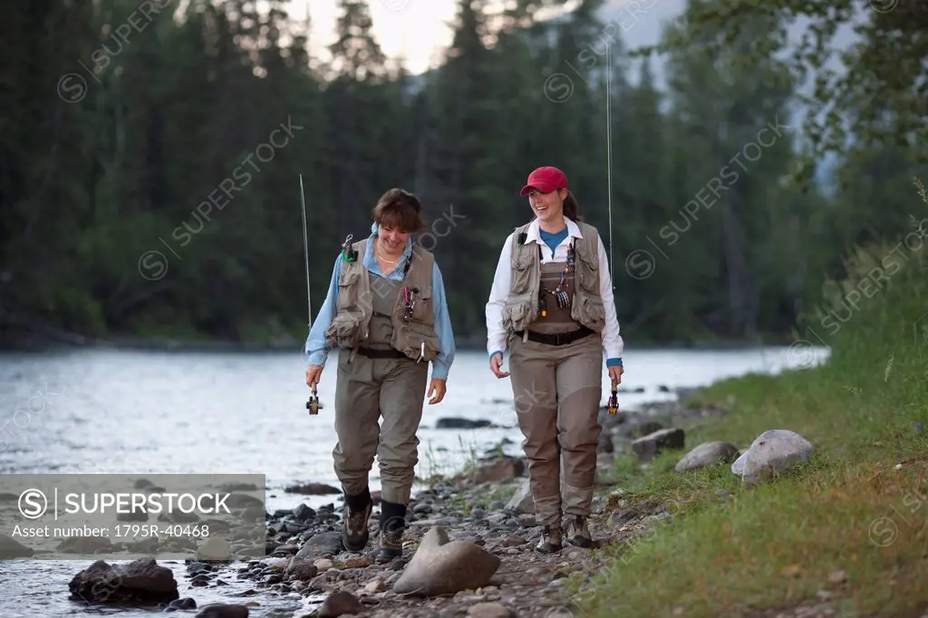 Canada, British Columbia, Fernie, daughter and mother fly fishing