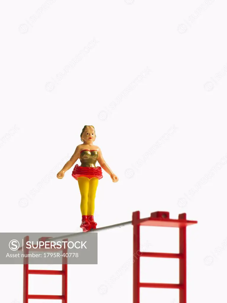Studio shot of figurines on ladders