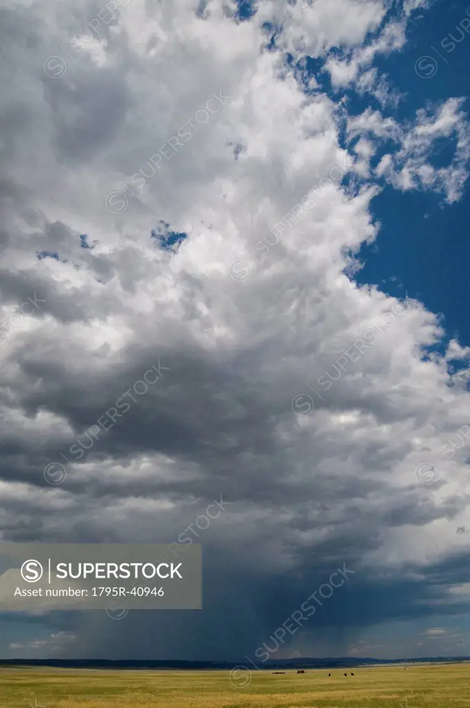 USA, Wyoming, Storm clouds over plains