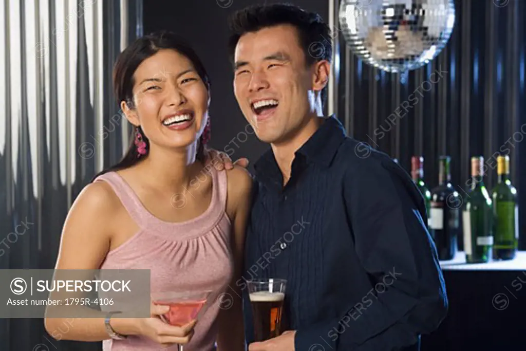 Couple having drinks in a bar
