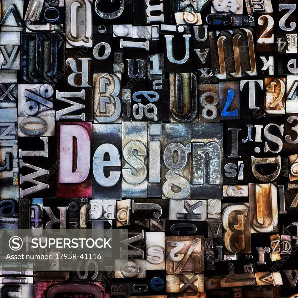 Assortment of printing blocks with word DESIGN in the middle of picture