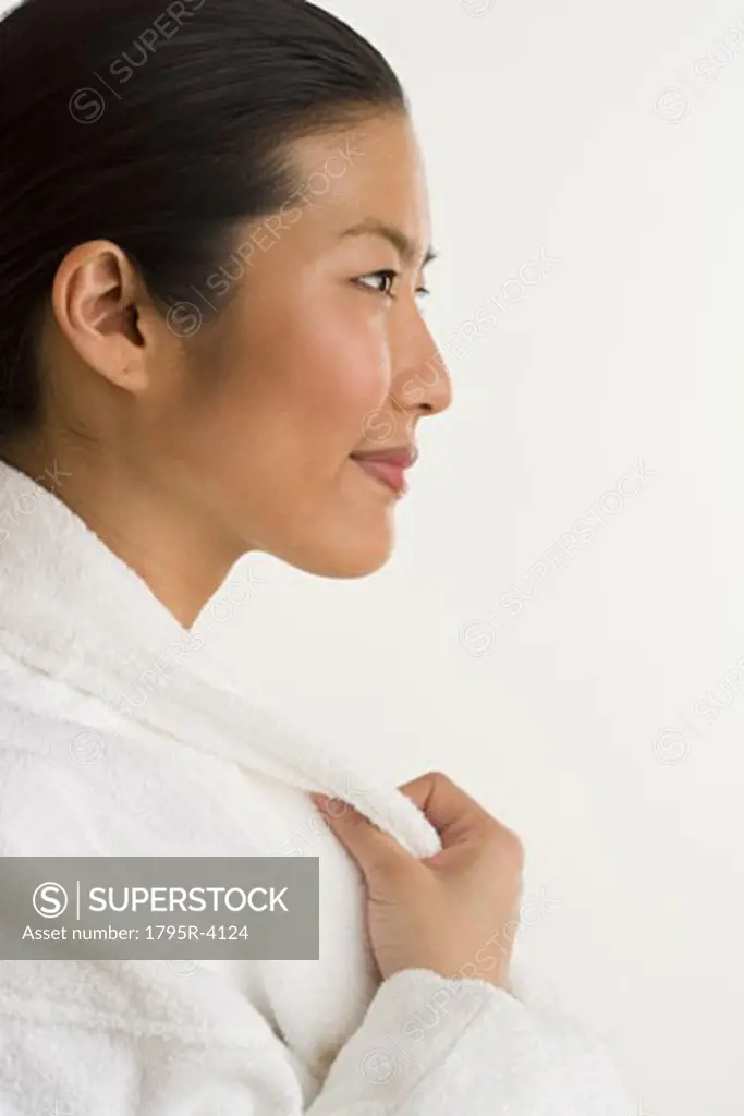 Portrait of woman in terrycloth robe