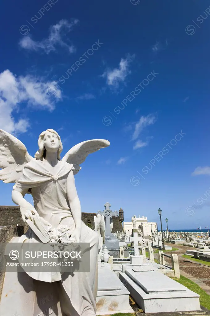 Puerto Rico, Old San Juan, Santa Maria Magdalena Cemetery with El Morro Fortress in background