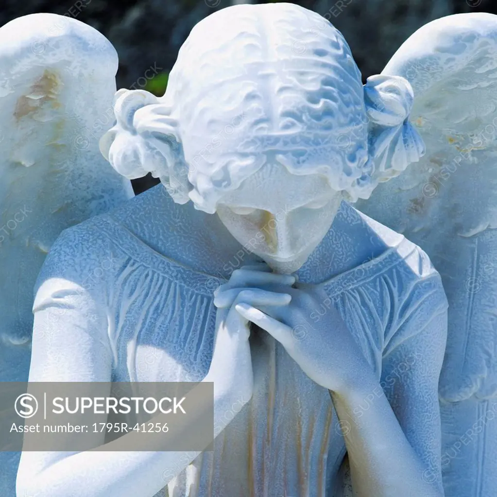 Puerto Rico, Old San Juan, Santa Maria Magdalena Cemetery, Close_up view of praying angel statue