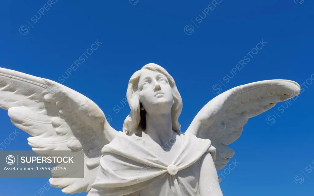 Puerto Rico, Old San Juan, Santa Maria Magdalena Cemetery, Close_up view of praying angel statue