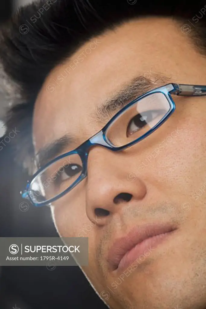 Headshot of man wearing glasses
