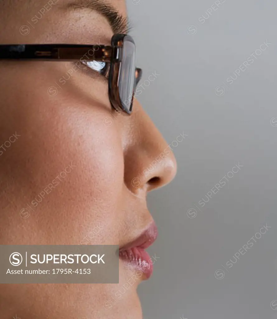 Profile view of woman wearing glasses