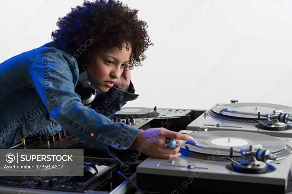 Woman working at a mixing board