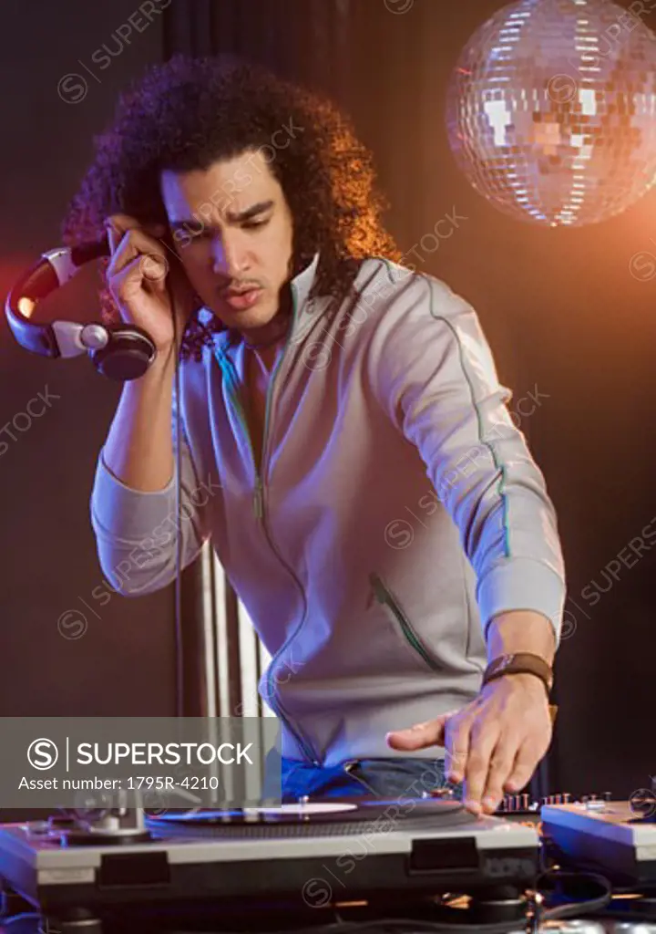 Man mixing sound at a dance club