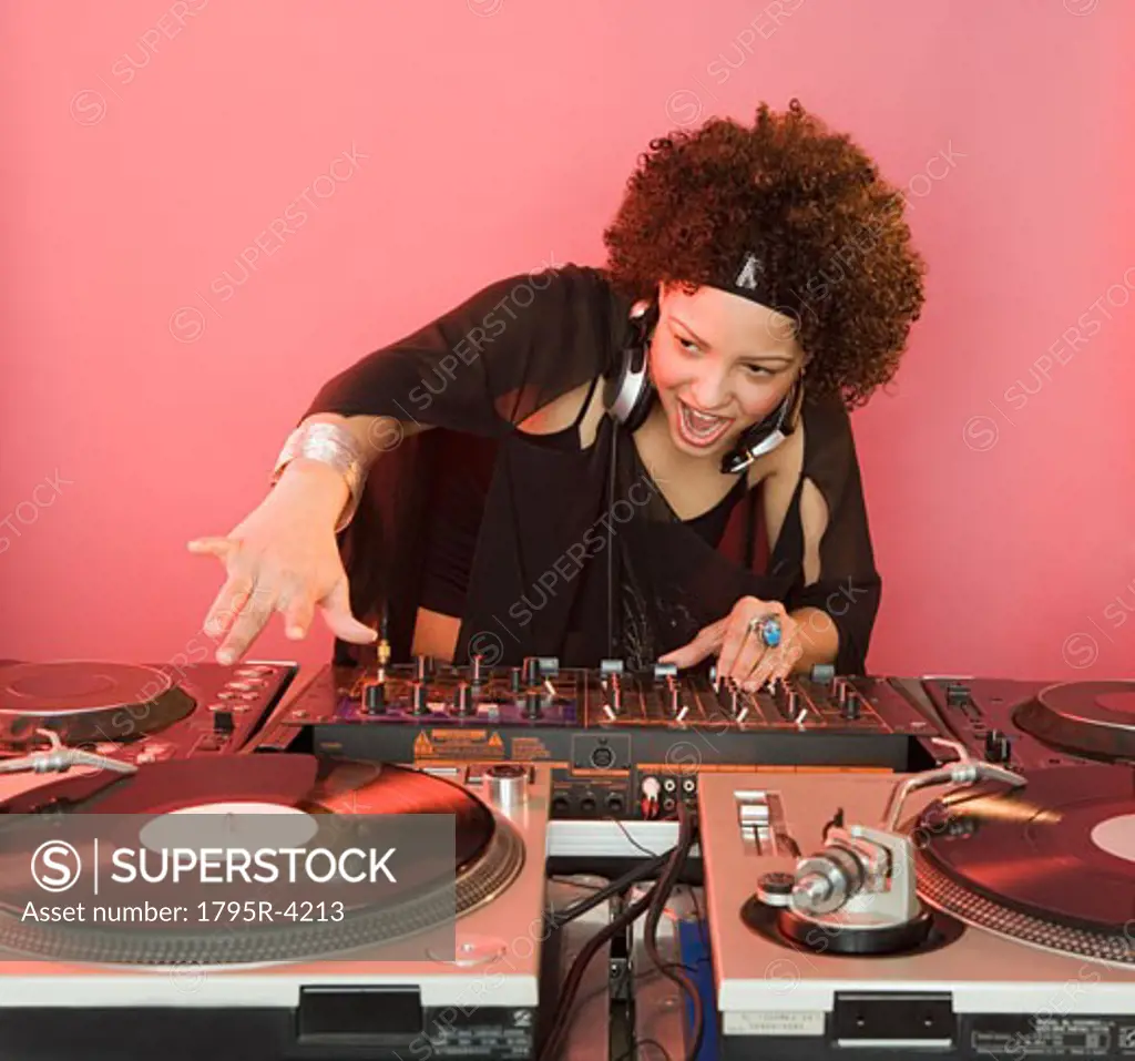 Woman working at a mixing board