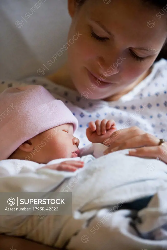 Portrait of newborn girl 0_1months with mother