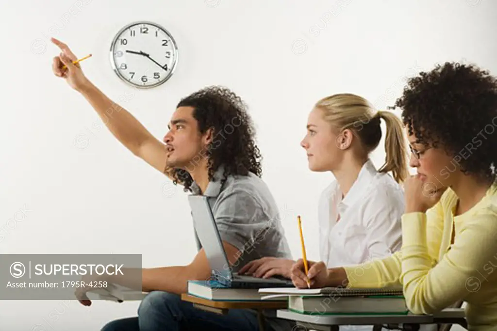 Three college students in class