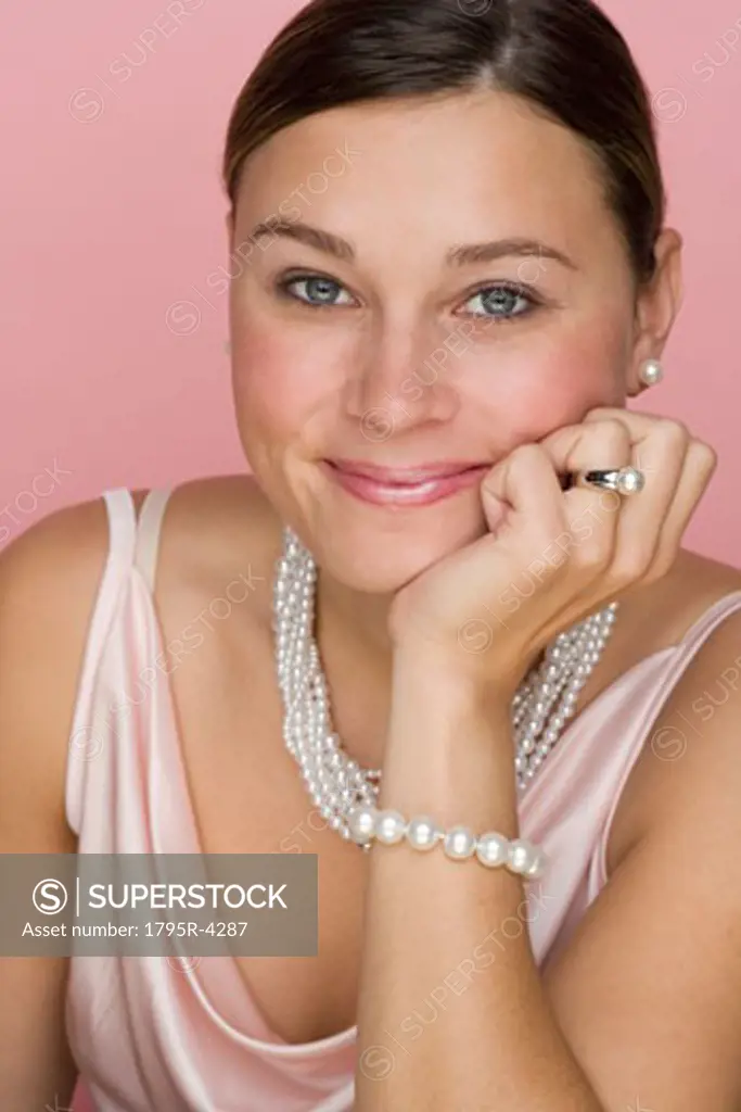 Studio shot of woman wearing pearls