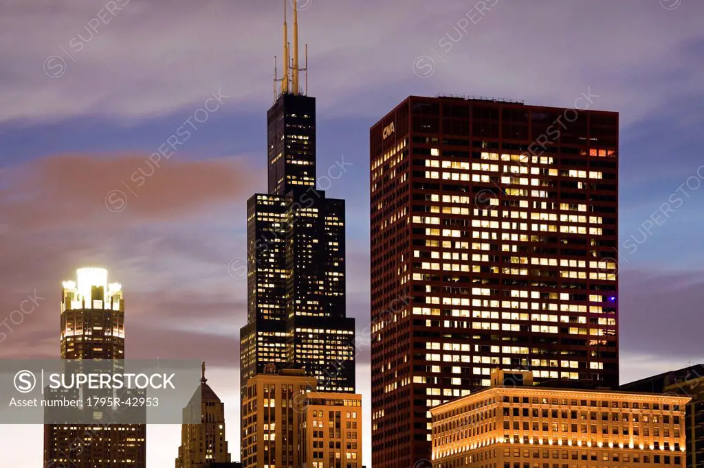 USA, Illinois, Chicago, Illuminated skyscrapers at dusk