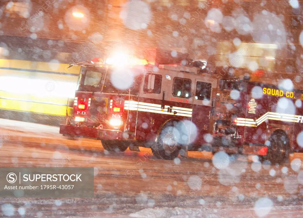 USA, New York City, Fire engine in blizzard