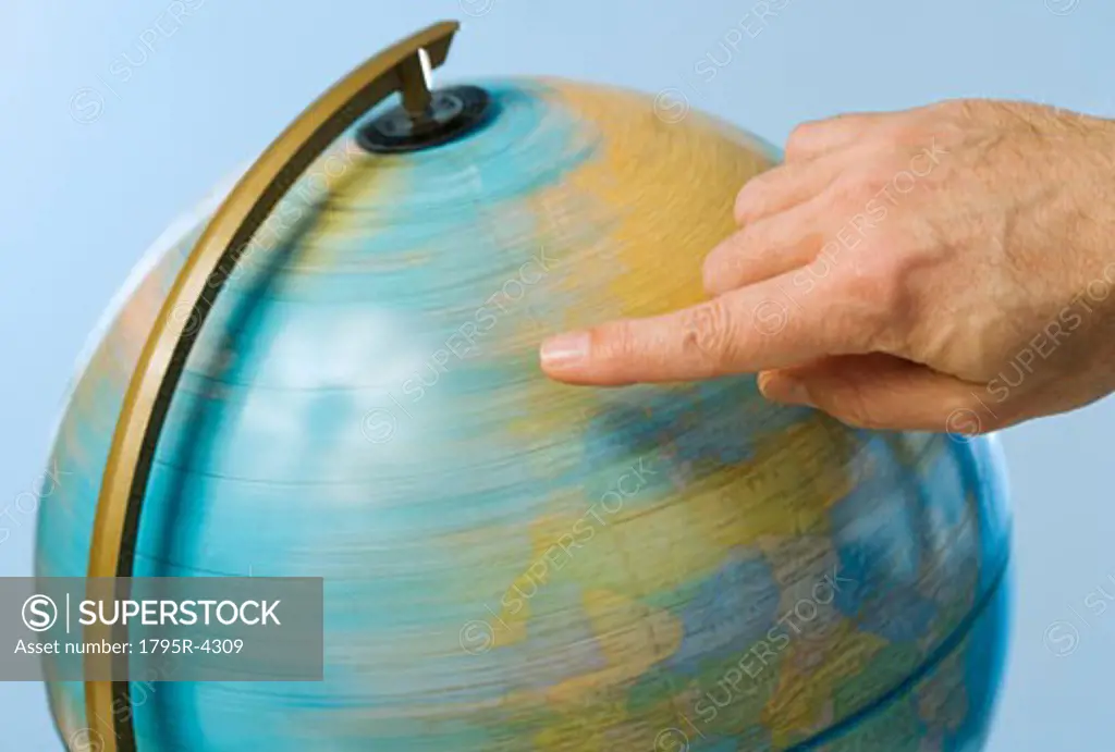 Hand spinning globe