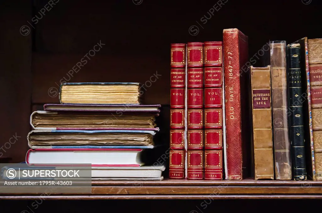 Close up of antique books on shelf