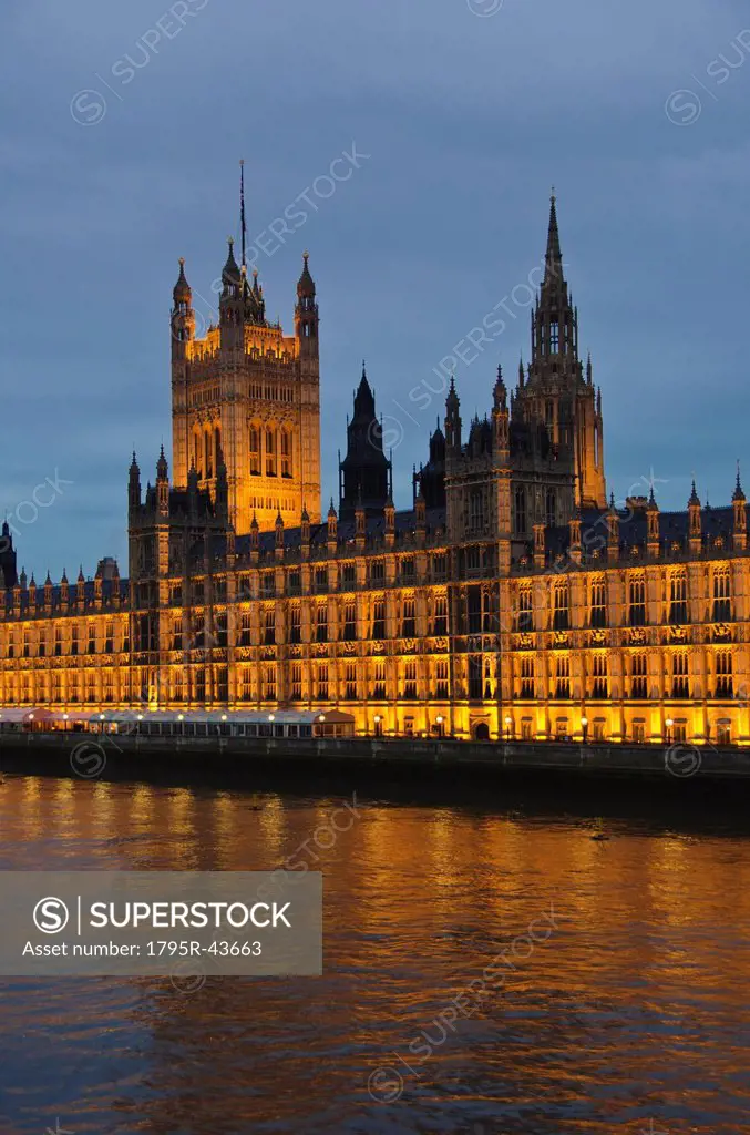 United Kingdom, London, Houses of Parliament illuminated at dusk