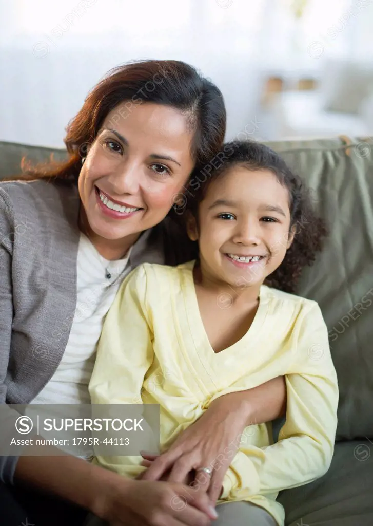 USA, New Jersey, Jersey City, portrait of smiling mother embracing daughter 6_7