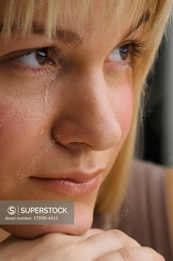 Close-up of woman crying