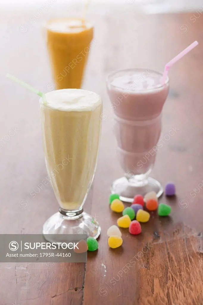 Selection of milk shakes and colorful jelly beans