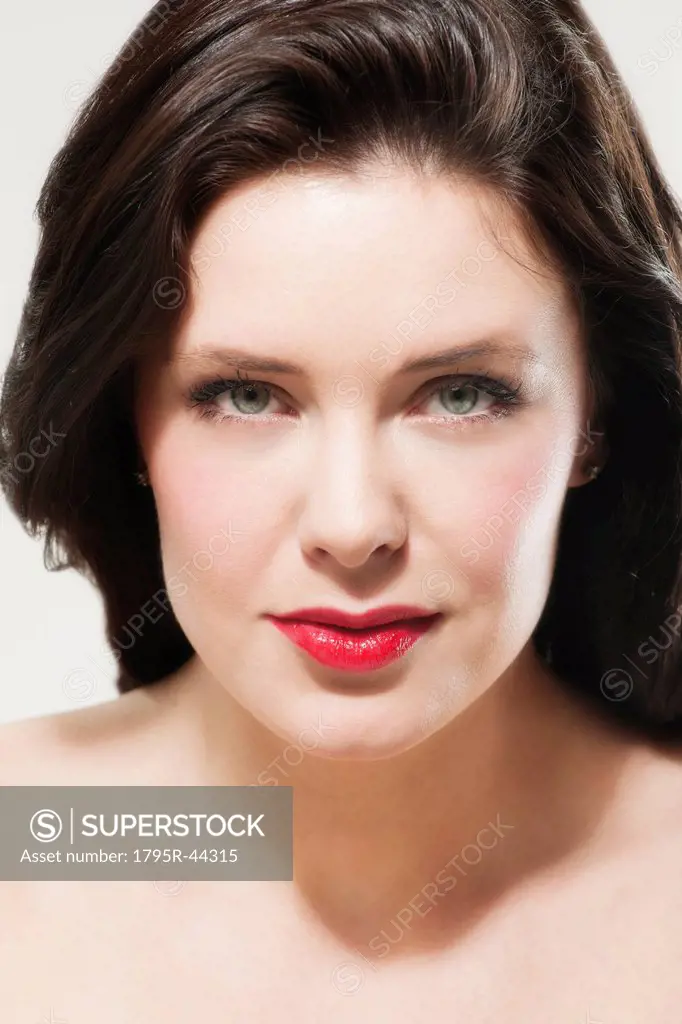 Portrait of young woman wearing red lipstick