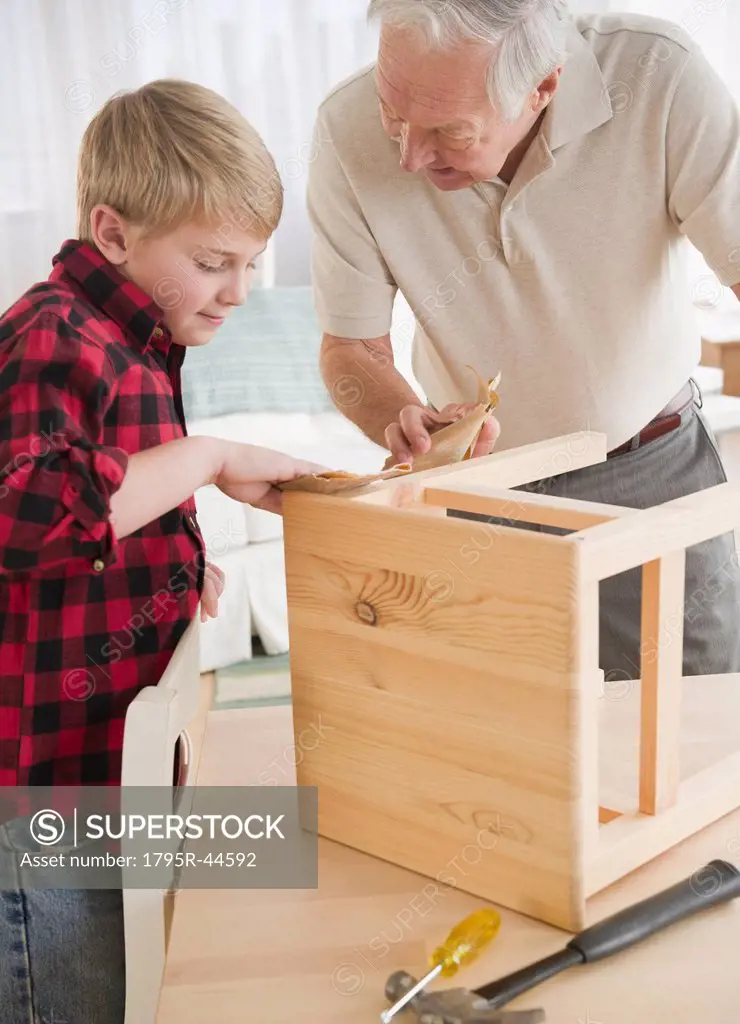 Grandfather and grandson 8_9 improving wooden stool