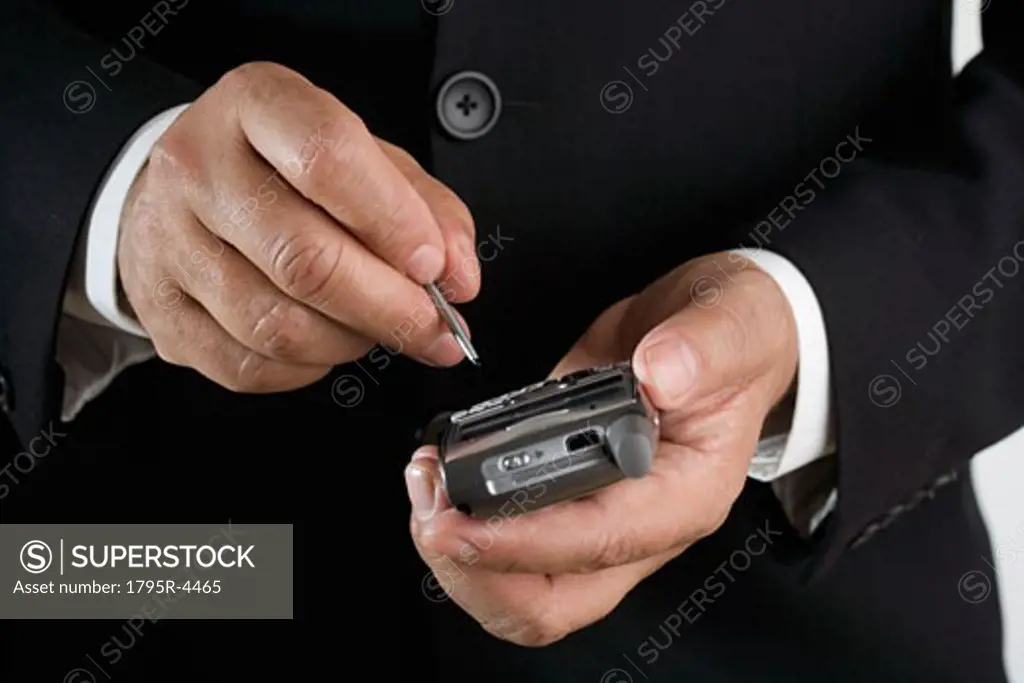 Close-up of businessman using PDA