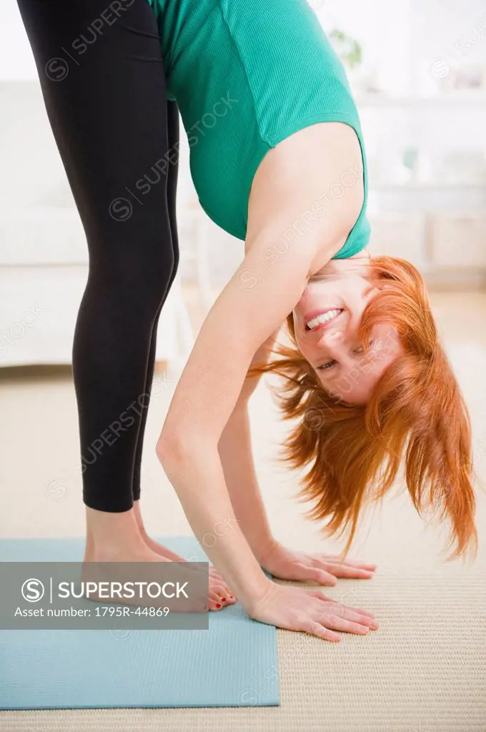 USA, New Jersey, Jersey City, woman stretching