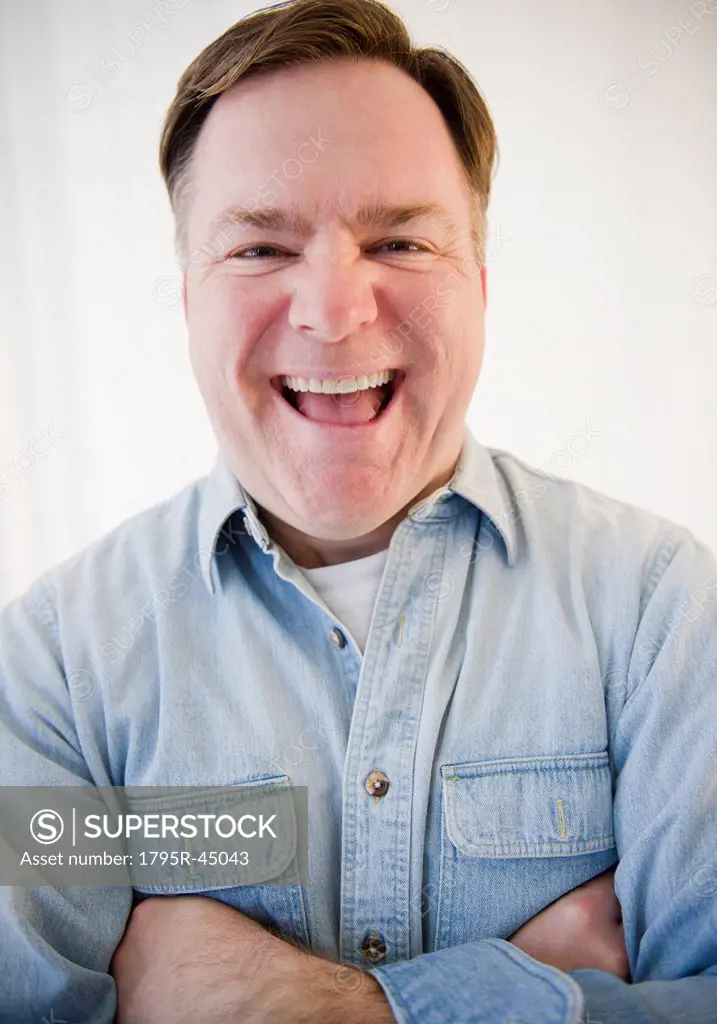 USA, Jersey City, New Jersey, portrait of man laughing