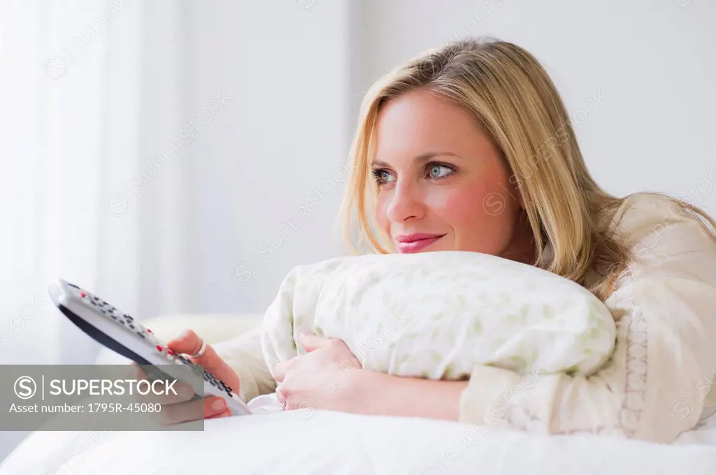 Woman using remote control