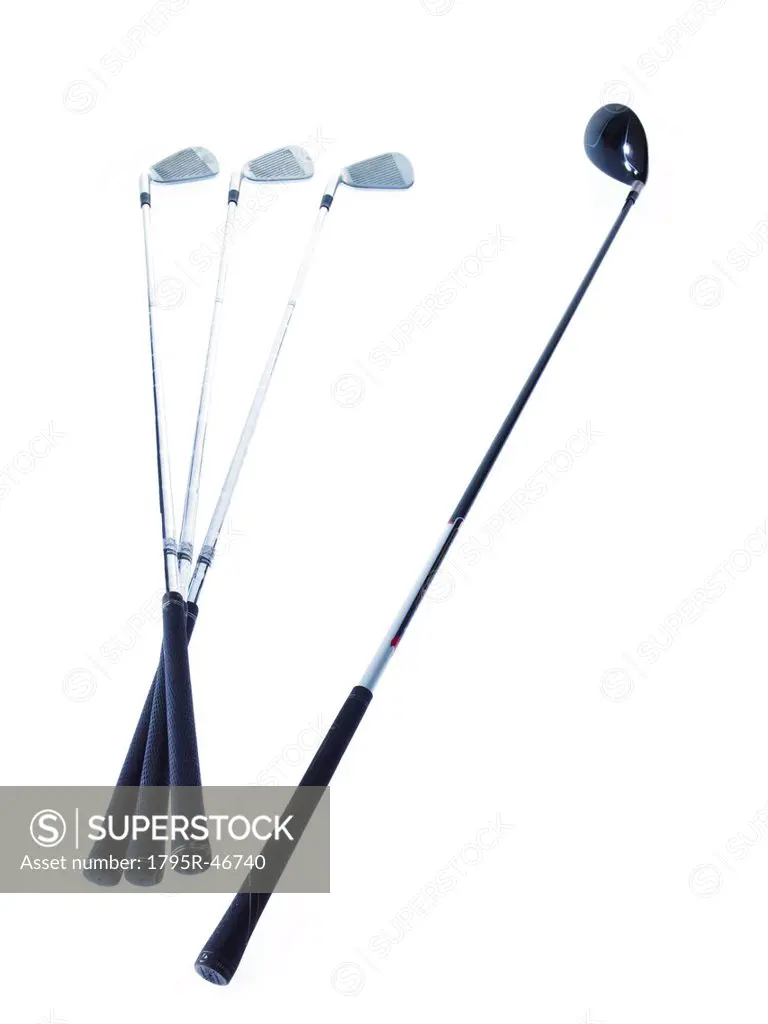 Golf clubs on white background