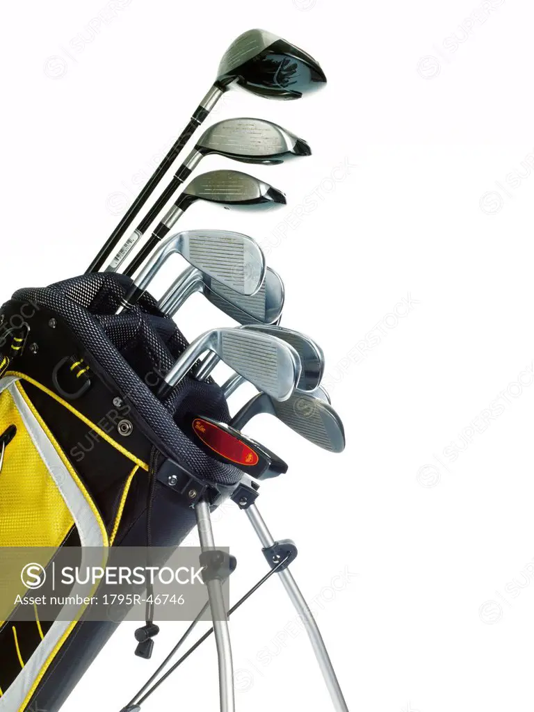 Golf bag with clubs on white background