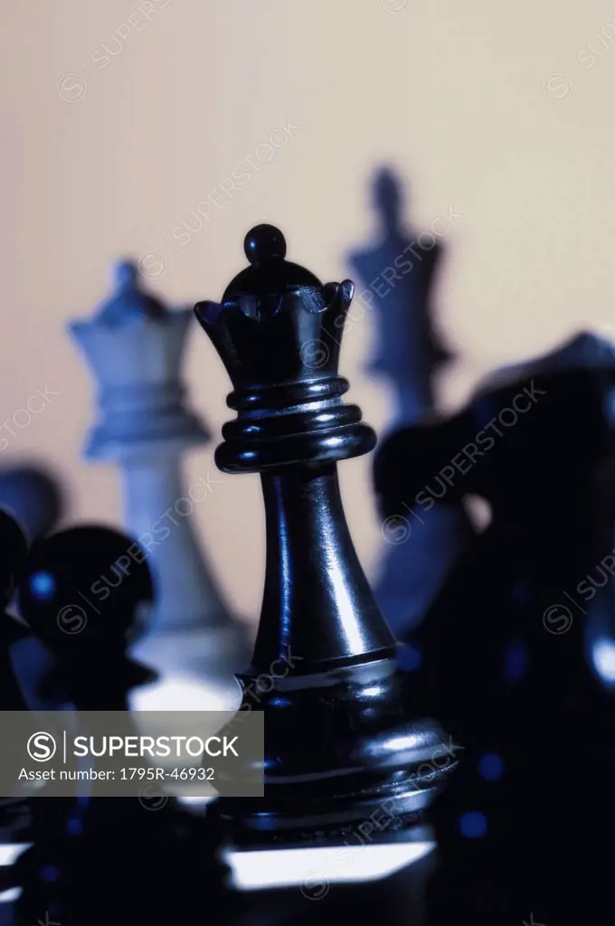 Queen chess piece on chess board