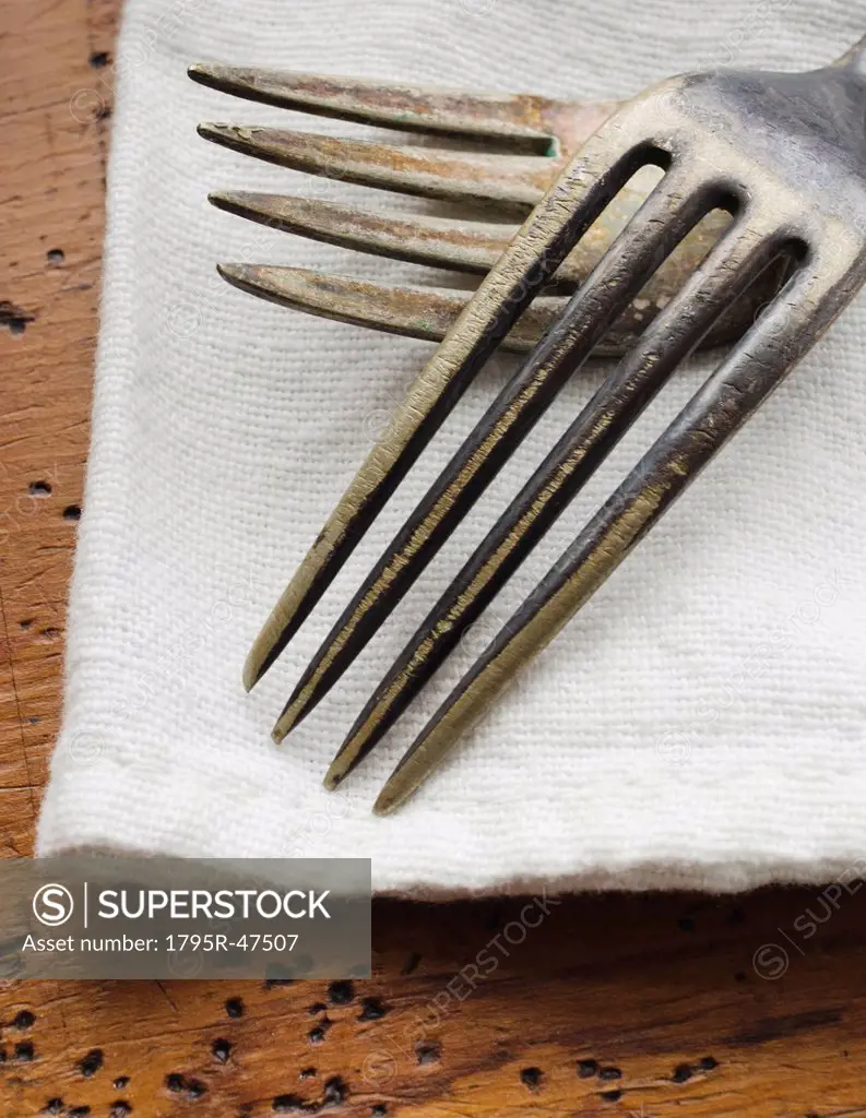 Two forks on napkin