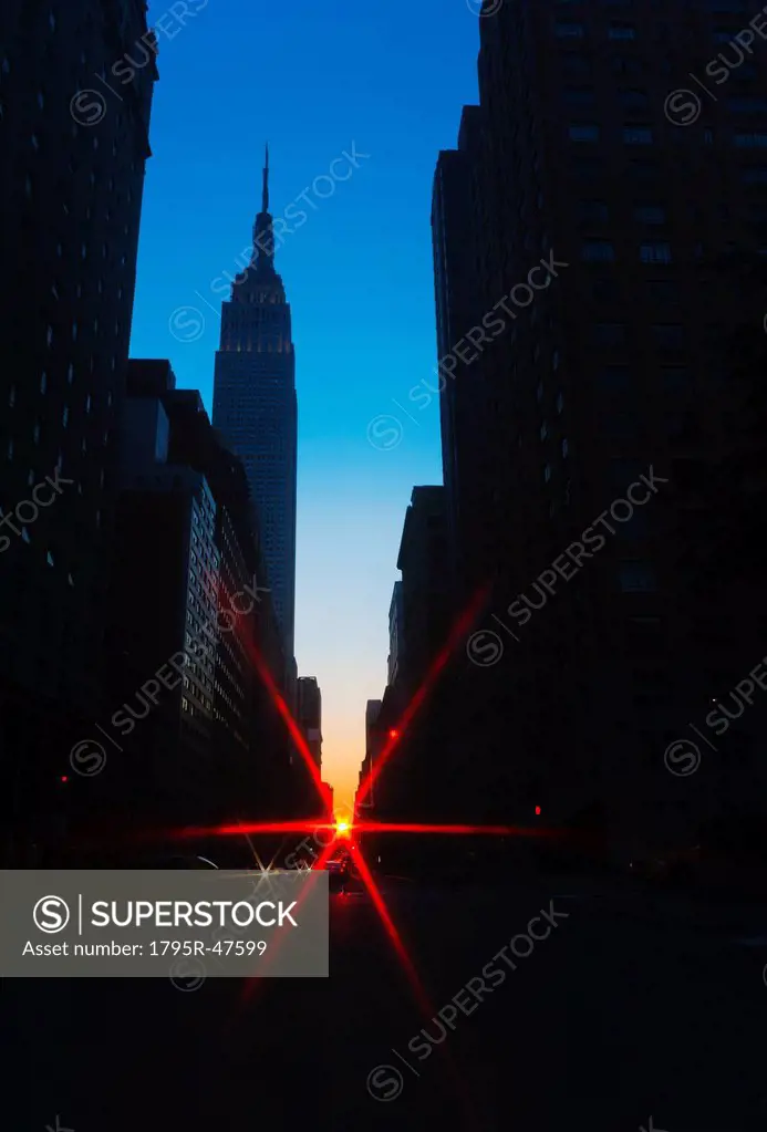 USA, New York, New York City, Silhouette of Empire State Building and street