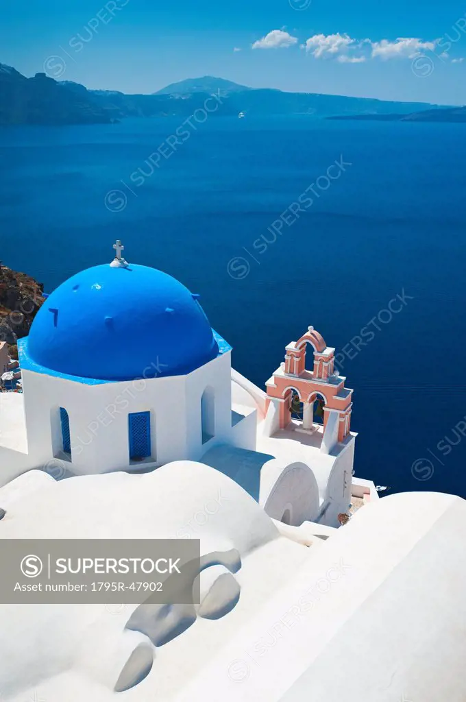 Greece, Cyclades Islands, Santorini, Oia, Church with bell tower at coast