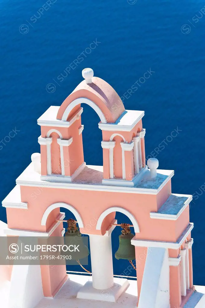 Greece, Cyclades Islands, Santorini, Oia, Church bell tower by sea