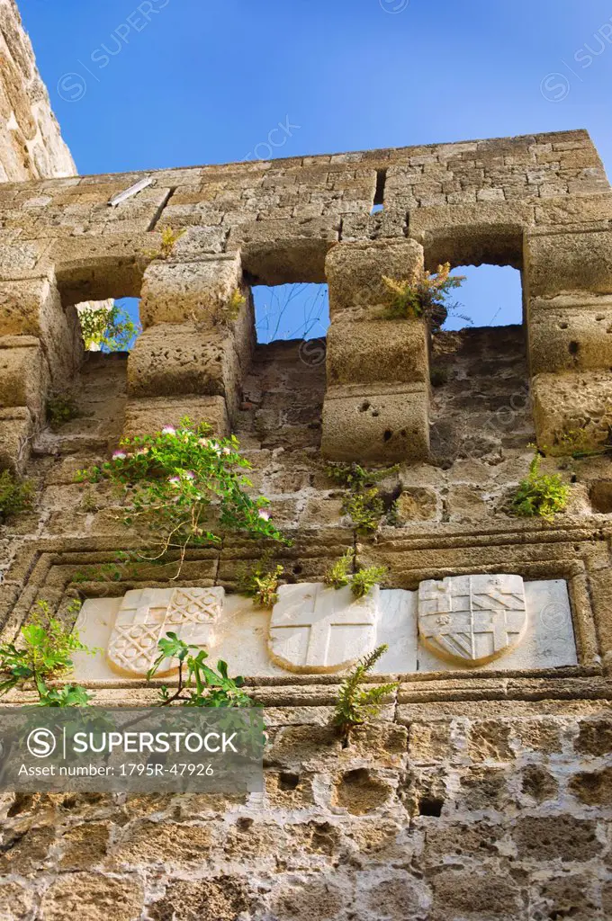 Greece, Rhodes, Medieval fortified wall with stone shields