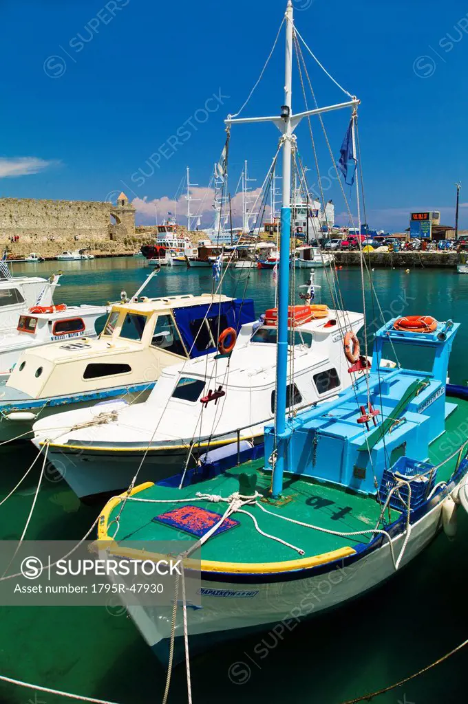 Greece, Rhodes, Harbor and old town wall