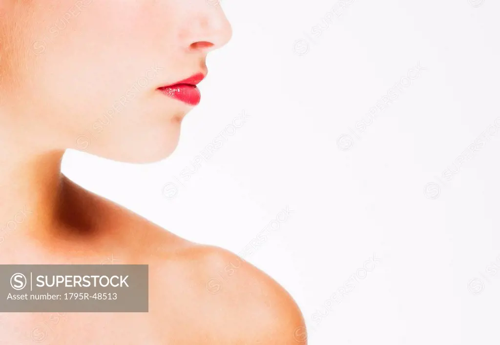 Studio shot of young woman wearing red lipstick