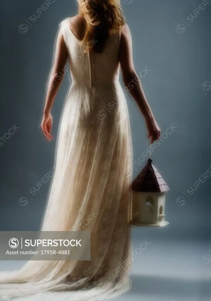 Woman wearing a long white dress