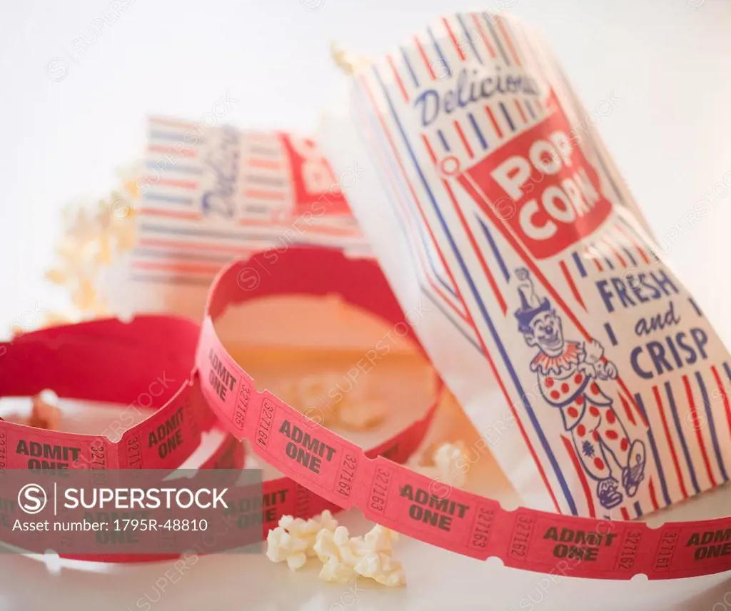 Close up of popcorn and tickets