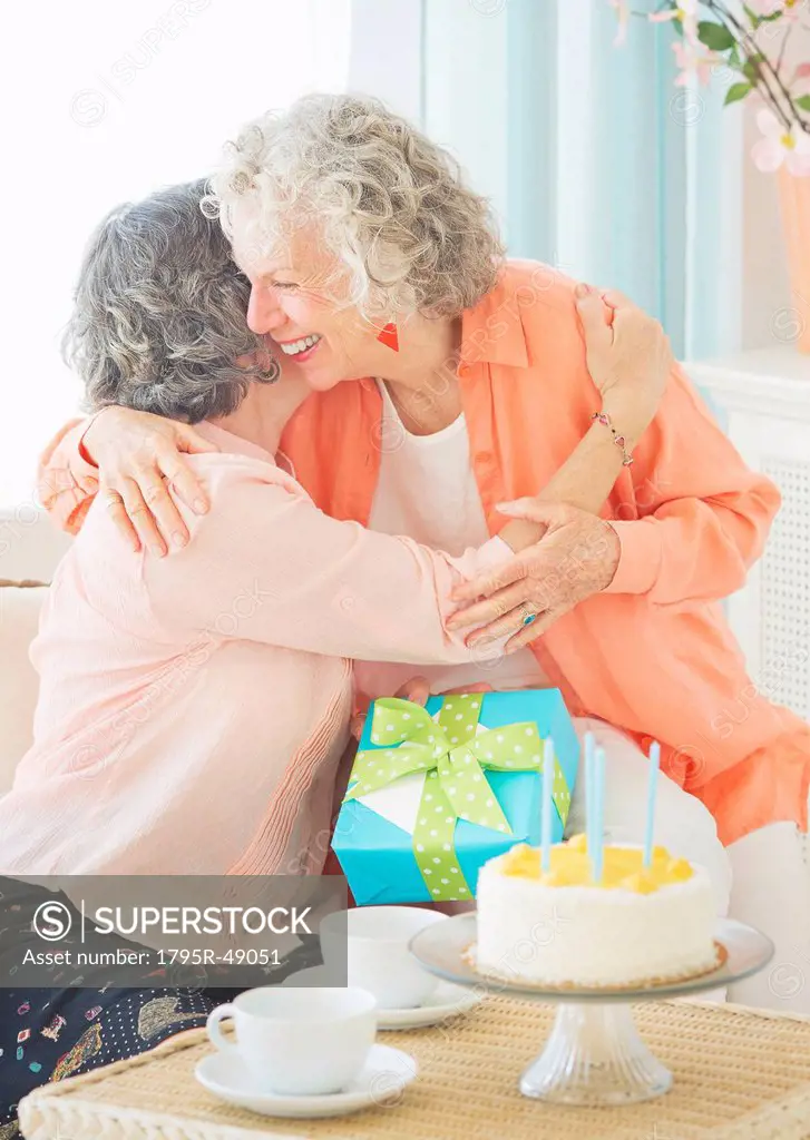Two senior women celebrating birthday
