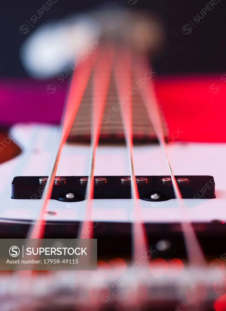 Close up of strings of bass guitar