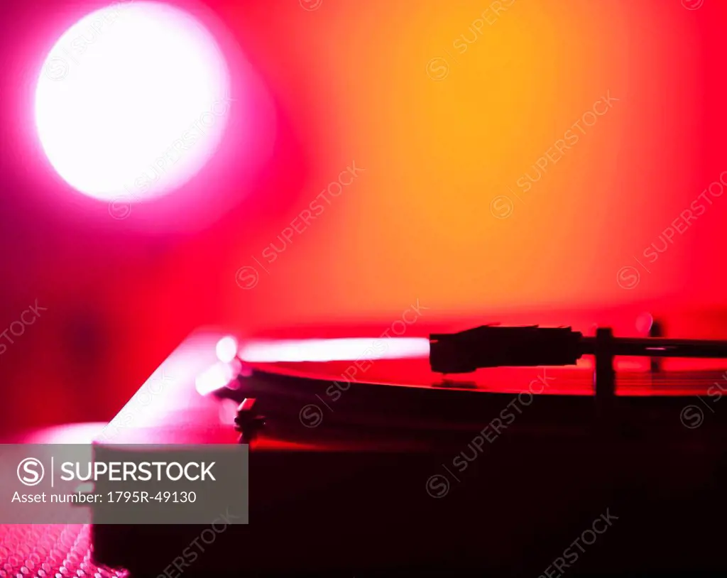 Close up of turntable on colored background