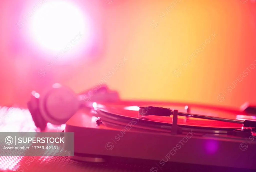 Close up of turntable on colored background